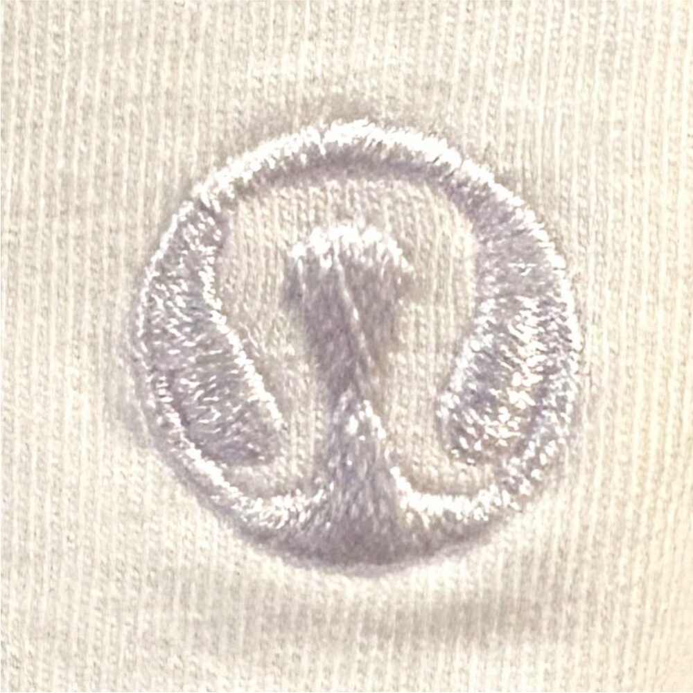 LuluLemon White Workout Shirt with Unique Neckline and babydoll bottom NWOT